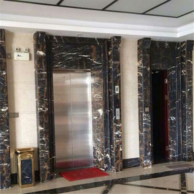 Marble door surround for lift door